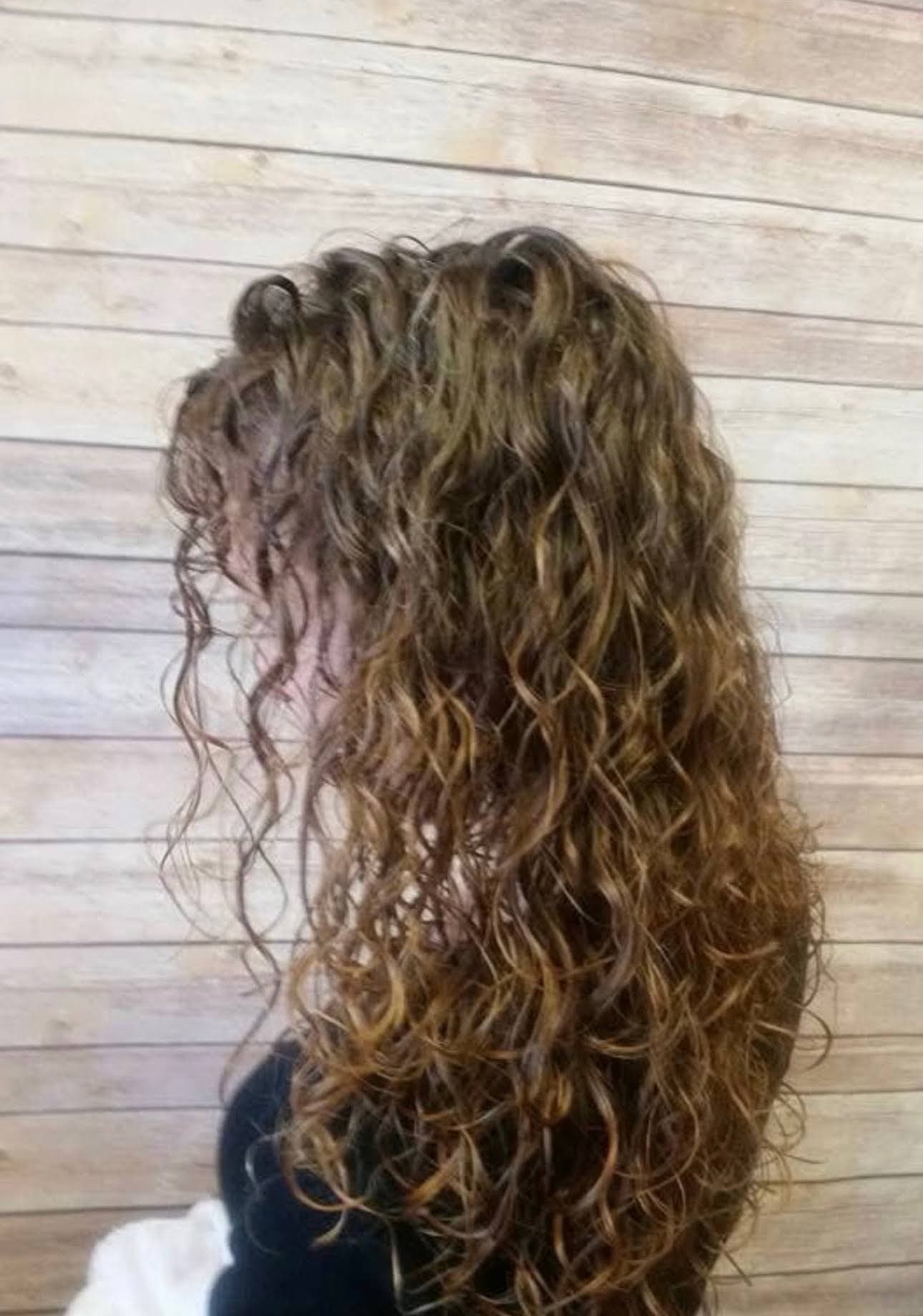 The same perm from behind, curl carried through to the ends